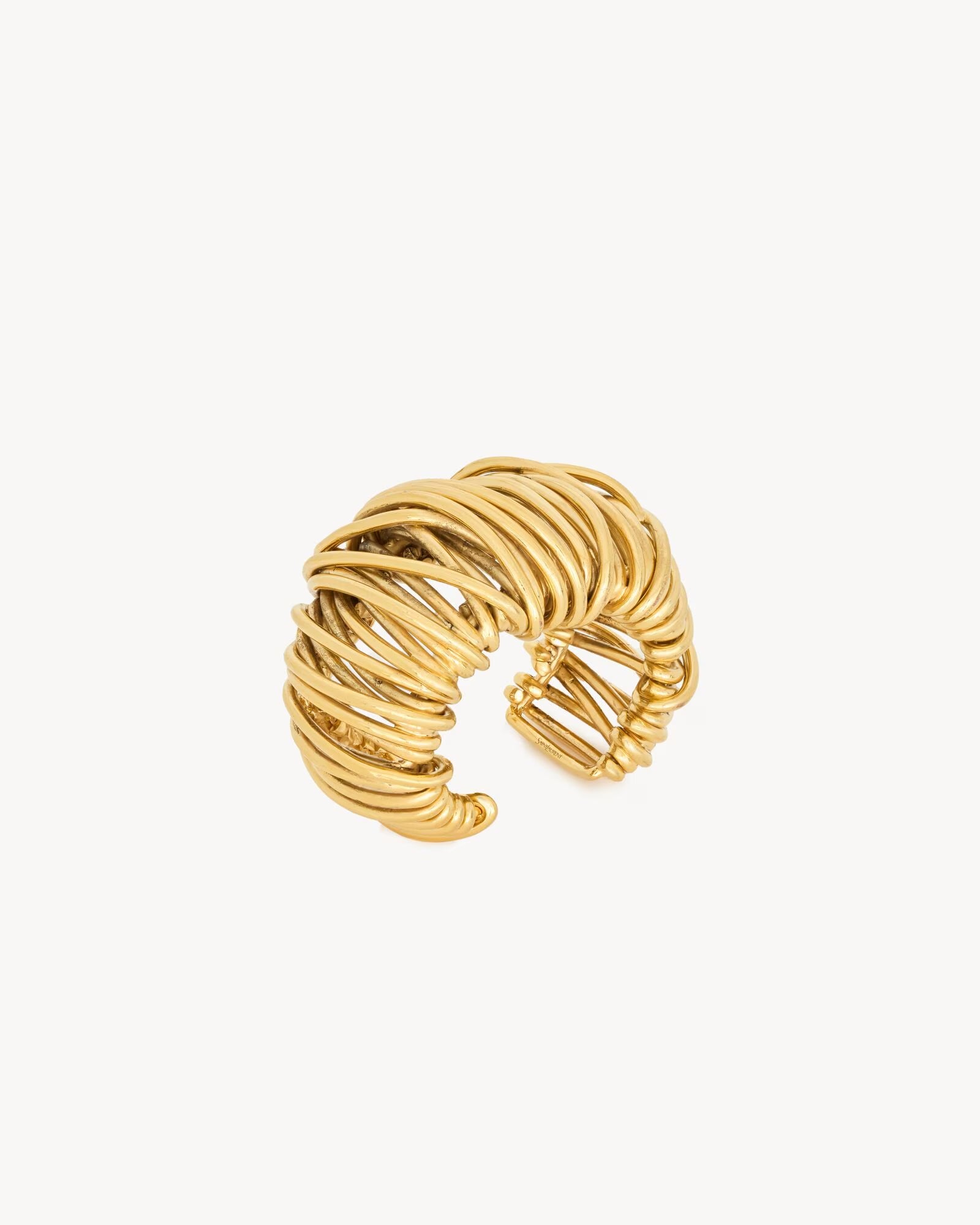 Coil cuff in metal